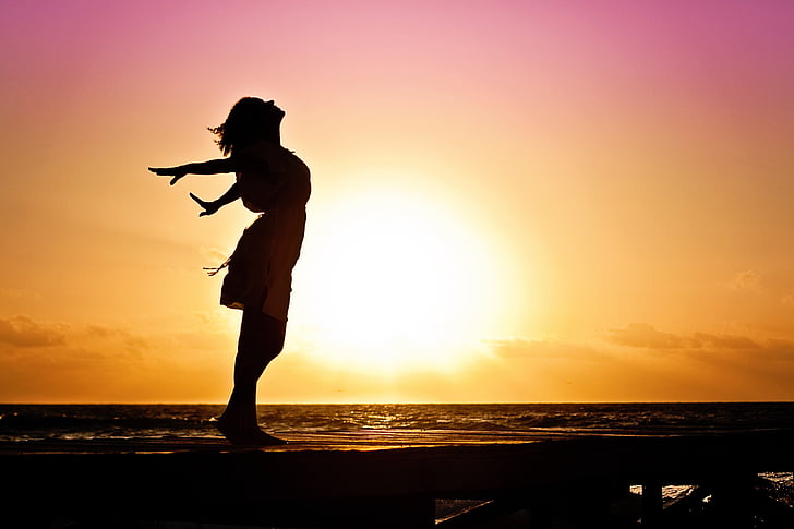 woman-happiness-sunrise-silhouette-preview.jpg